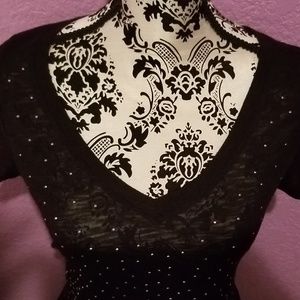 Black top with reflective  metal details size M